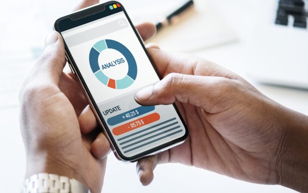 Businessman checking stock market online Businessman checking stock market online